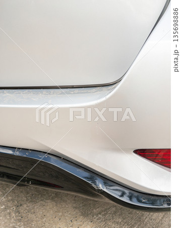 Dented and scratched the rear bumper of a silver SUV. Dented and scratched the rear bumper of a silver SUV. 135698886