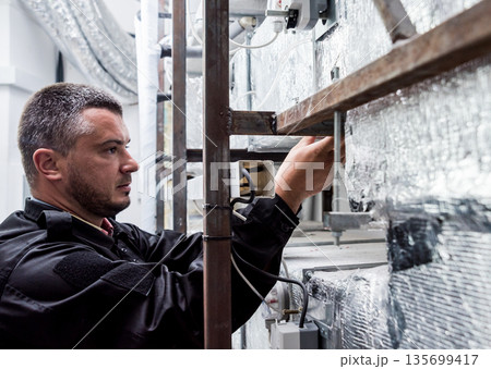 Ventilation cleaning. Specialist at work. Repair ventilation system Ventilation cleaning. Specialist at work. Repair ventilation system 135699417