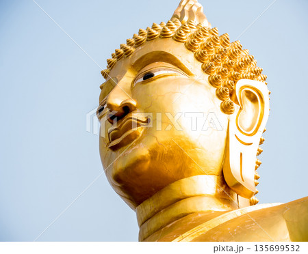 Symbols of Buddhism. South-Eastern Asia. Details of buddhist temple in Thailand. Symbols of Buddhism. South-Eastern Asia. Details of buddhist temple in Thailand. 135699532