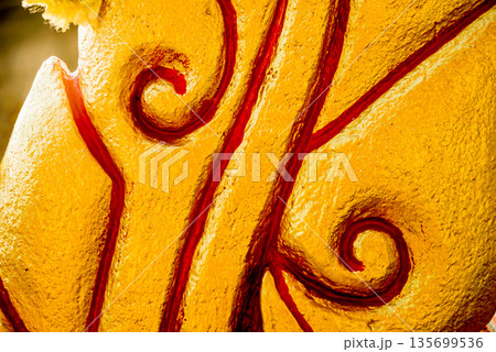 Symbols of Buddhism. South-Eastern Asia. Details of buddhist temple in Thailand. Symbols of Buddhism. South-Eastern Asia. Details of buddhist temple in Thailand. 135699536