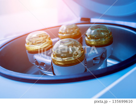 Platelet-Rich plasma preparation. Centrifuge. Modern medical background 135699610