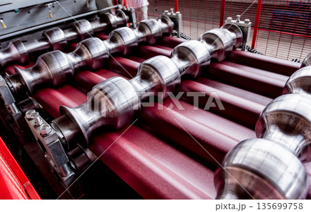 Metal sheet forming machine at the modern metalwork factory. Metal sheet forming machine at the modern metalwork factory. 135699758