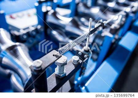 Metal sheet forming machine at the modern metalwork factory. Metal sheet forming machine at the modern metalwork factory. 135699764