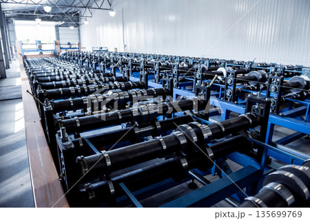 Metal sheet forming machine at the modern metalwork factory. 135699769