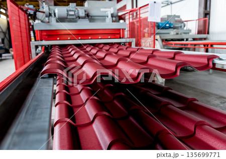 Metal sheet forming machine at the modern metalwork factory. 135699771