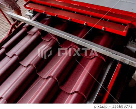 Metal sheet forming machine at the modern metalwork factory. Metal sheet forming machine at the modern metalwork factory. 135699772