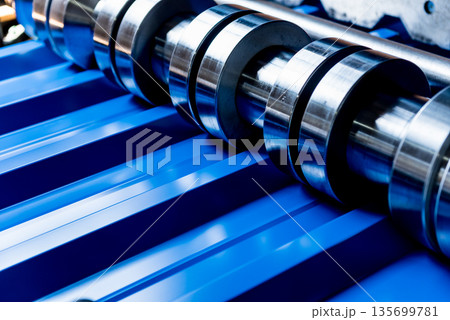 Metal sheet forming machine at the modern metalwork factory. Metal sheet forming machine at the modern metalwork factory. 135699781