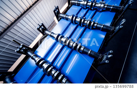 Metal sheet forming machine at the modern metalwork factory. Metal sheet forming machine at the modern metalwork factory. 135699788