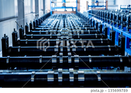 Metal sheet forming machine at the modern metalwork factory. Metal sheet forming machine at the modern metalwork factory. 135699789
