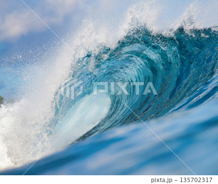 Vast Ocean Wave Crashing Fiercely, Powerful Surf Surging Beneath Bright Sky Vast Ocean Wave Crashing Fiercely, Powerful Surf Surging Beneath Bright Sky 135702317
