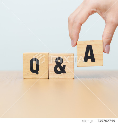 wooden cube block of Q and A with Question mark icon. FAQ, frequency asked questions, Answer, Question Ask, doubt, idea, Information, Communication and Brainstorming Concepts wooden cube block of Q and A with Question mark icon. FAQ, frequency asked questions, Answer, Question Ask, doubt, idea, Information, Communication and Brainstorming Concepts 135702749