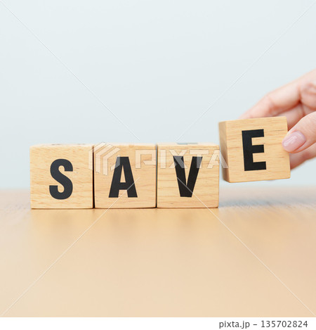 hand change wooden block Save to Safe. money savings, risk management, investment, financial security and business concept hand change wooden block Save to Safe. money savings, risk management, investment, financial security and business concept 135702824