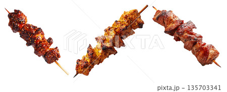Anticuchos grilled beef meat skewer isolated on white transparent background, concept of South American barbecue cuisine Anticuchos grilled beef meat skewer isolated on white transparent background, concept of South American barbecue cuisine 135703341