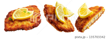 Milanesa breaded beef chicken schnitzel or cutlet with fresh lemon wedge, isolated on white background, South American Cuisine 135703342