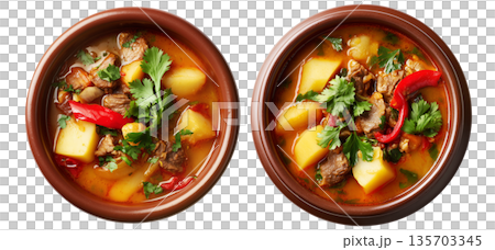 Cazuela chilean Stew pot served in rustic bowl isolated on white background, South American Cuisine Cazuela chilean Stew pot served in rustic bowl isolated on white background, South American Cuisine 135703345
