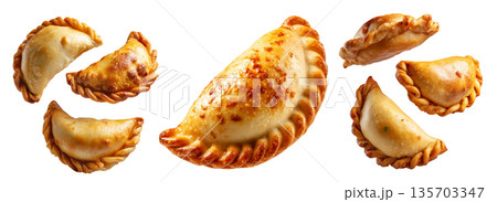 Argentina and Uruguay empanadas stacked in a pyramid, golden baked crust, meat and potato filling, isolated on white background Argentina and Uruguay empanadas stacked in a pyramid, golden baked crust, meat and potato filling, isolated on white background 135703347