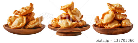 Sopaipillas fried dough or bread, sweet or savory stacked together, isolated on white background. Concept of Mexican street food Sopaipillas fried dough or bread, sweet or savory stacked together, isolated on white background. Concept of Mexican street food 135703360