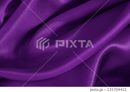 Purple fabric cloth texture for background and design art work, beautiful crumpled pattern of silk or linen. Purple fabric cloth texture for background and design art work, beautiful crumpled pattern of silk or linen. 135704421