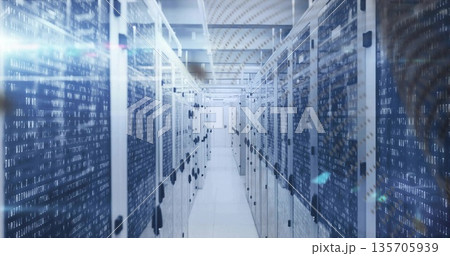 Stretching server room aisle showing racks blinking LEDs, network switches, overhead cable trays 135705939