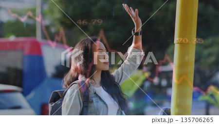 Raising hand female commuter signalling bus at stop pole with backpack smartwatch and stock charts Raising hand female commuter signalling bus at stop pole with backpack smartwatch and stock charts 135706265