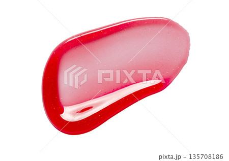 A sample of lip moisturizer on a white background. Oil or lip balm. A sample of lip moisturizer on a white background. Oil or lip balm. 135708186