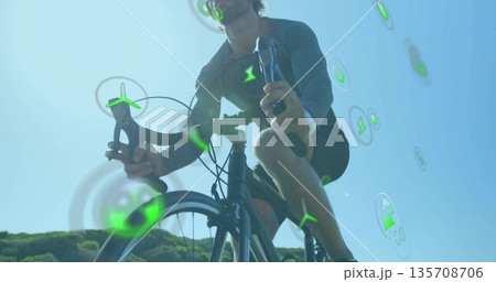 Pedaling cyclist in kit on path beside green hills with drop-bar bike, holographic energy icons Pedaling cyclist in kit on path beside green hills with drop-bar bike, holographic energy icons 135708706
