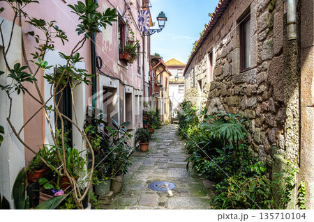 Colorful narrow street with balconies in Porto, Portugal 135710104