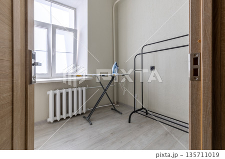 Laundry and ironing room in hostel with basic amenities Laundry and ironing room in hostel with basic amenities 135711019