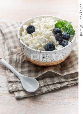 Cottage cheese with blueberries offering healthy breakfast snack Cottage cheese with blueberries offering healthy breakfast snack 135713927