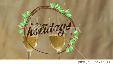 Image of happy holidays text over glasses of champagne 135716914