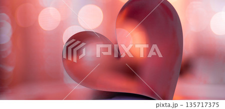 Romantic red Valentine Day heart from folded book pages, warm blur bokeh lights background, panoramic love banner wallpaper, elegant holiday romance decoration 135717375