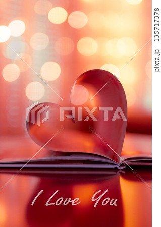 Vertical red Valentine Day heart from folded book pages, soft warm bokeh lights, romantic love background, elegant holiday design with inspirational love quotes Vertical red Valentine Day heart from folded book pages, soft warm bokeh lights, romantic love background, elegant holiday design with inspirational love quotes 135717378