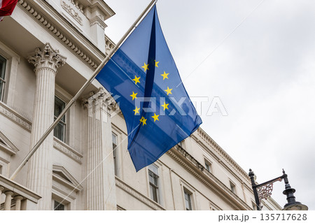 European Union Flag Waving in Front of Government Building European Union Flag Waving in Front of Government Building 135717628