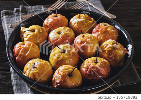 Tasty Baked Apples with Pecans and Honey Tasty Baked Apples with Pecans and Honey 135718892