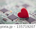 Small red heart on computer circuit board. Internet dating concept. 135719207
