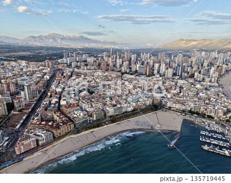 coastal skyline lively, seaside cityscape vibrant and sunny, urban waterfront featuring beaches and yachts coastal skyline lively, seaside cityscape vibrant and sunny, urban waterfront featuring beaches and yachts 135719445