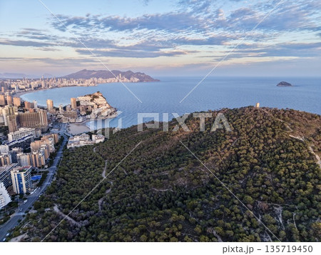 tranquil ocean vista, peaceful maritime landscape featuring forested heights and distant landmass tranquil ocean vista, peaceful maritime landscape featuring forested heights and distant landmass 135719450