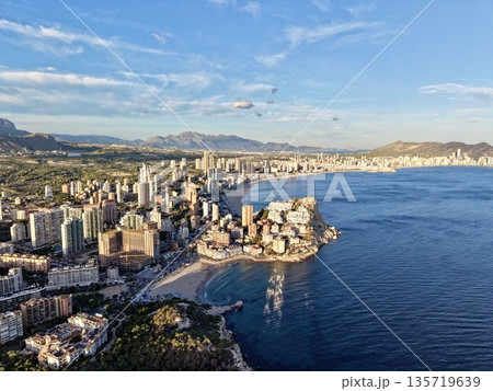 seaside urban retreat, vibrant seaside metropolis featuring clear waters and boatfilled horizons 135719639