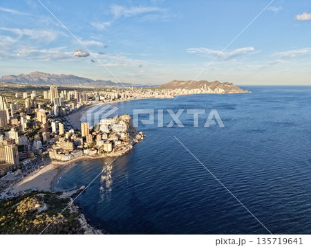 remotecontrolled aerial imagery displays architectural formations alongside shoreline elements 135719641