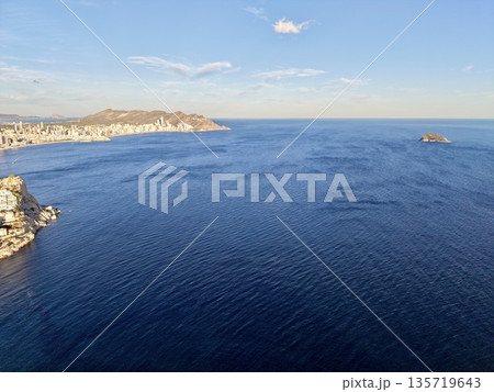 vast waters with calm surroundings, peaceful maritime panorama showcasing distant coastlines and serenity vast waters with calm surroundings, peaceful maritime panorama showcasing distant coastlines and serenity 135719643