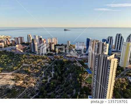 cityscape with natural contrast, aerial perspective showcasing city development and countryside 135719701