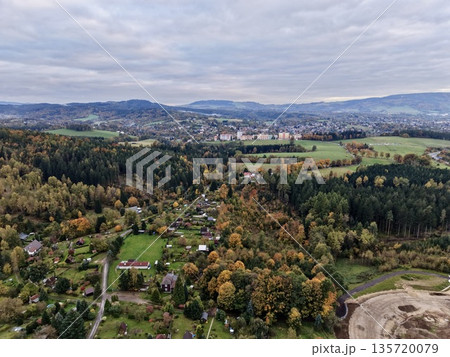 agricultural and woodland valley area, extensive valley featuring fields and forest regions agricultural and woodland valley area, extensive valley featuring fields and forest regions 135720079
