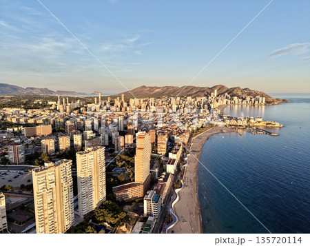 guided stroll through vibrant urban shoreline framed by towering structures and sparkling water 135720114