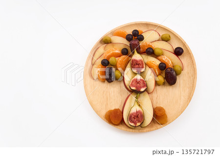 Tu b'shevat tree arranging dried and fresh fruits Tu b'shevat tree arranging dried and fresh fruits 135721797
