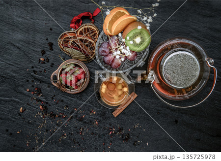 Glass of freshly brewed fruit and herbal tea. 135725978