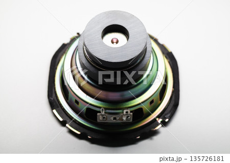 Macro shot of a vibrant speaker component with a magnet 135726181