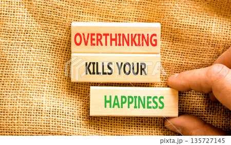 Overthinking kills your happiness symbol. Concept words Overthinking kills your happiness on wooden blocks. Beautiful canvas background. Business overthinking kills happiness concept. Copy space. 135727145