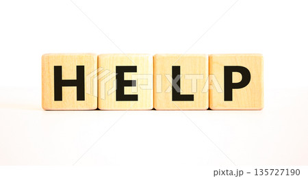 Help symbol. Concept word Help on beautiful wooden blocks. Beautiful white table white background. Business, lifestyle, support and help concept. Copy space. Help symbol. Concept word Help on beautiful wooden blocks. Beautiful white table white background. Business, lifestyle, support and help concept. Copy space. 135727190