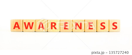Awareness symbol. Concept word Awareness on beautiful wooden blocks. Beautiful white background. Business education awareness concept. Copy space. Awareness symbol. Concept word Awareness on beautiful wooden blocks. Beautiful white background. Business education awareness concept. Copy space. 135727240