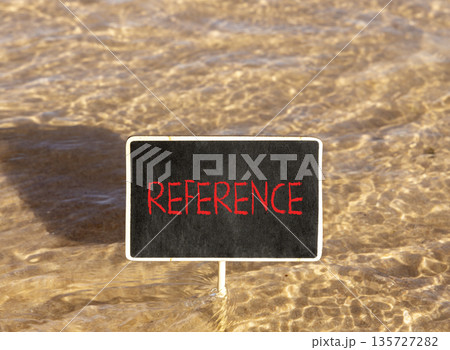 References or reference symbol. Concept word Reference on beautiful black blackboard. Beautiful Red sea water background. Business references or reference concept. Copy space. References or reference symbol. Concept word Reference on beautiful black blackboard. Beautiful Red sea water background. Business references or reference concept. Copy space. 135727282